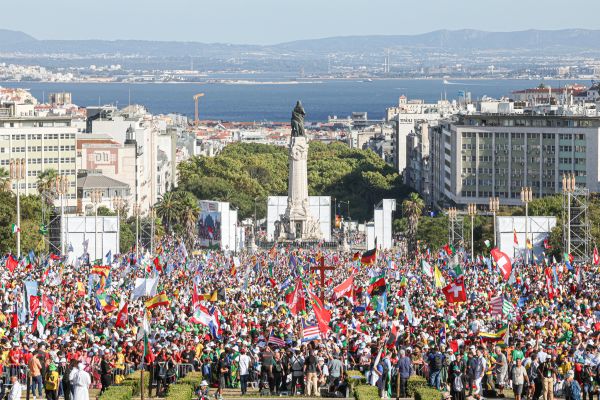A view of the crowd and nearby waterfront at the opening Mass for World Youth Day in Lisbon, Portugal, on Aug. 1, 2023. Credit: Arlindo Homem / JMJ Lisboa 2023