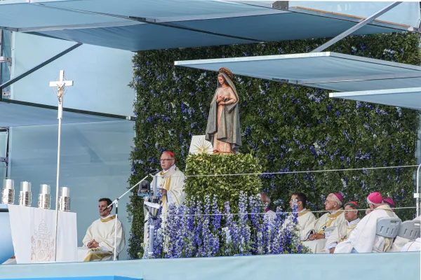 Cardinal Manuel Clemente, the Patriarch of Lisbon, greets attendees of World Youth Day at the opening Mass on Aug. 1, 2023, in Lisbon, Portugal. Credit: Arlindo Homem / JMJ Lisboa 2023