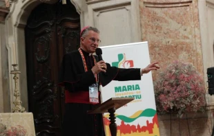 Archbishop Timothy Broglio speaks to young people about adoration and pondering during a Rise Up Encounter at the Church of Our Lady of the Incarnation in Lisbon, Portugal on Aug. 4, 2023. Credit: Claudette Jerez/EWTN News