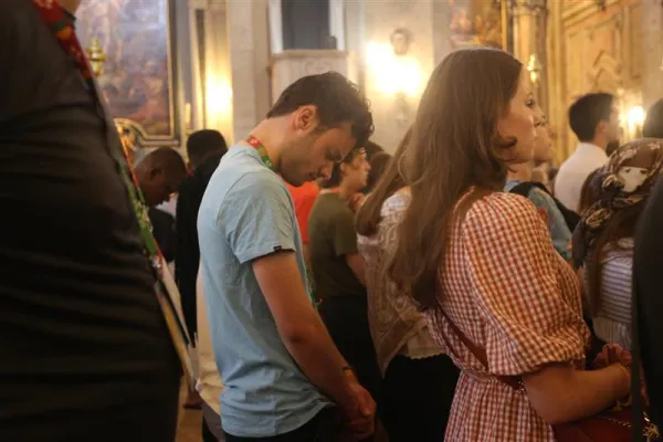 Young people from the Netherlands, Poland, the Philippines, Ireland, Australia, the United States, and Liberia participated in a Rise Up Encounter with Archbishop Charles Thompson of Indianapolis in the Church of Our Lady of Providence in Lisbon, Portugal, on Aug. 2, 2023. The morning included praise and worship, a catechesis, a question and answer session, and Mass. Credit: Hannah Brockhaus/CNA
