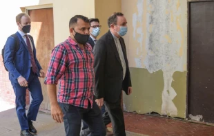 Argentine retired Bishop Gustavo Oscar Zanchetta (R) arrives to court in Oran, Argentina, on March 3, 2022. Zanchetta, considered close to Pope Francis, was sentenced to four years and six months in prison for sexual abuse of two seminarians by a court in the northwestern city of Oran, which ordered his immediate arrest, according to the ruling. Gaston India/AFP via Getty Images